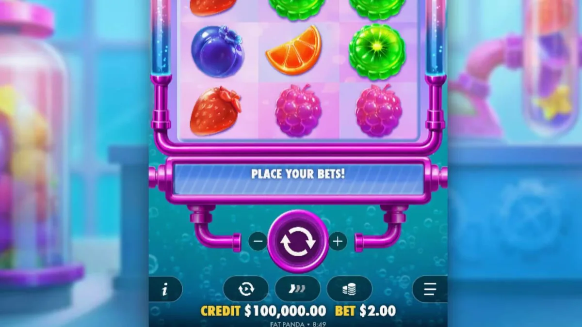 หน้าจอเกมสล็อต Sweet Burst ที่เต็มไปด้วยขนมหวานและอุปกรณ์ห้องแล็บ